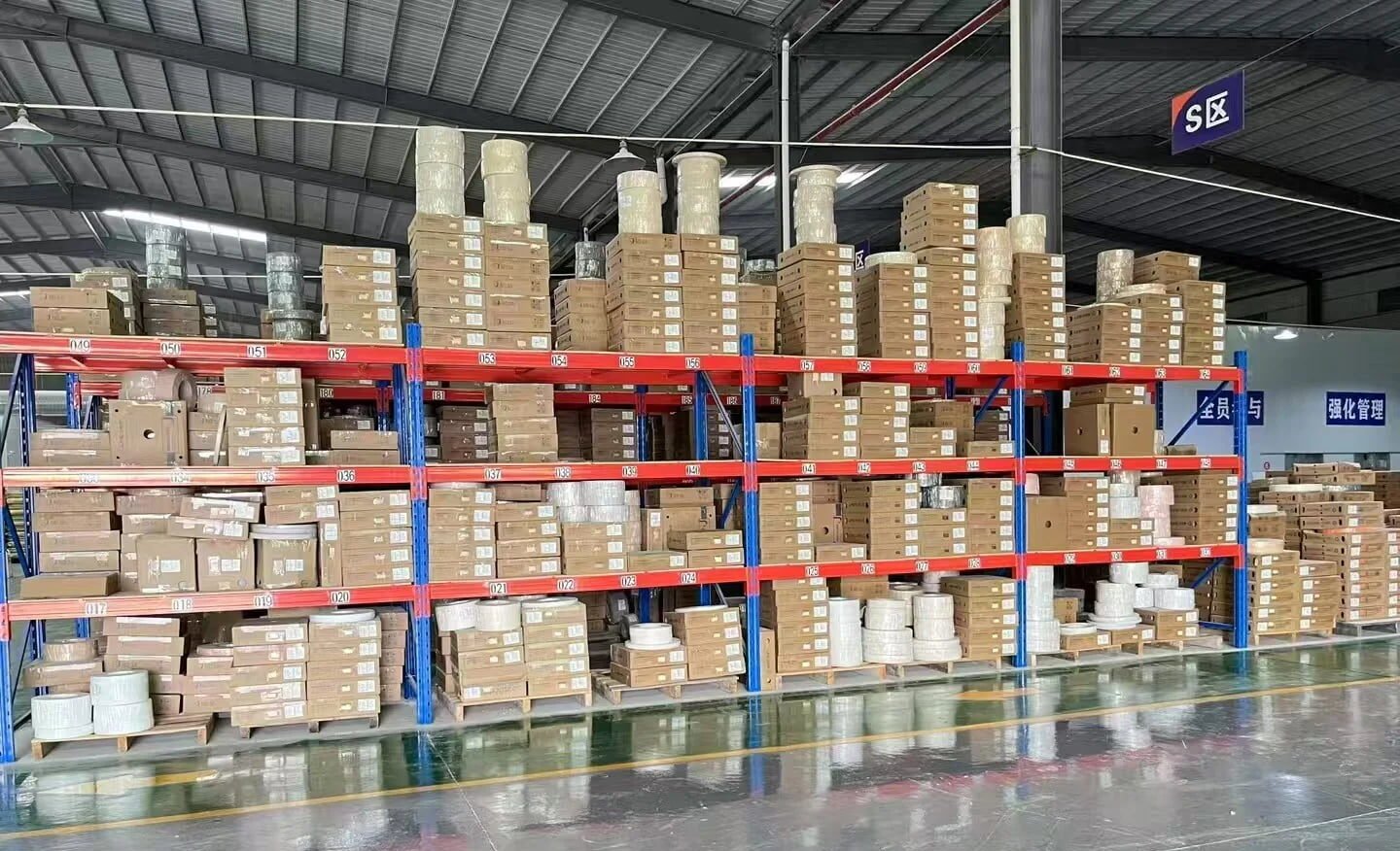 Packaged edge banding rolls in warehouse