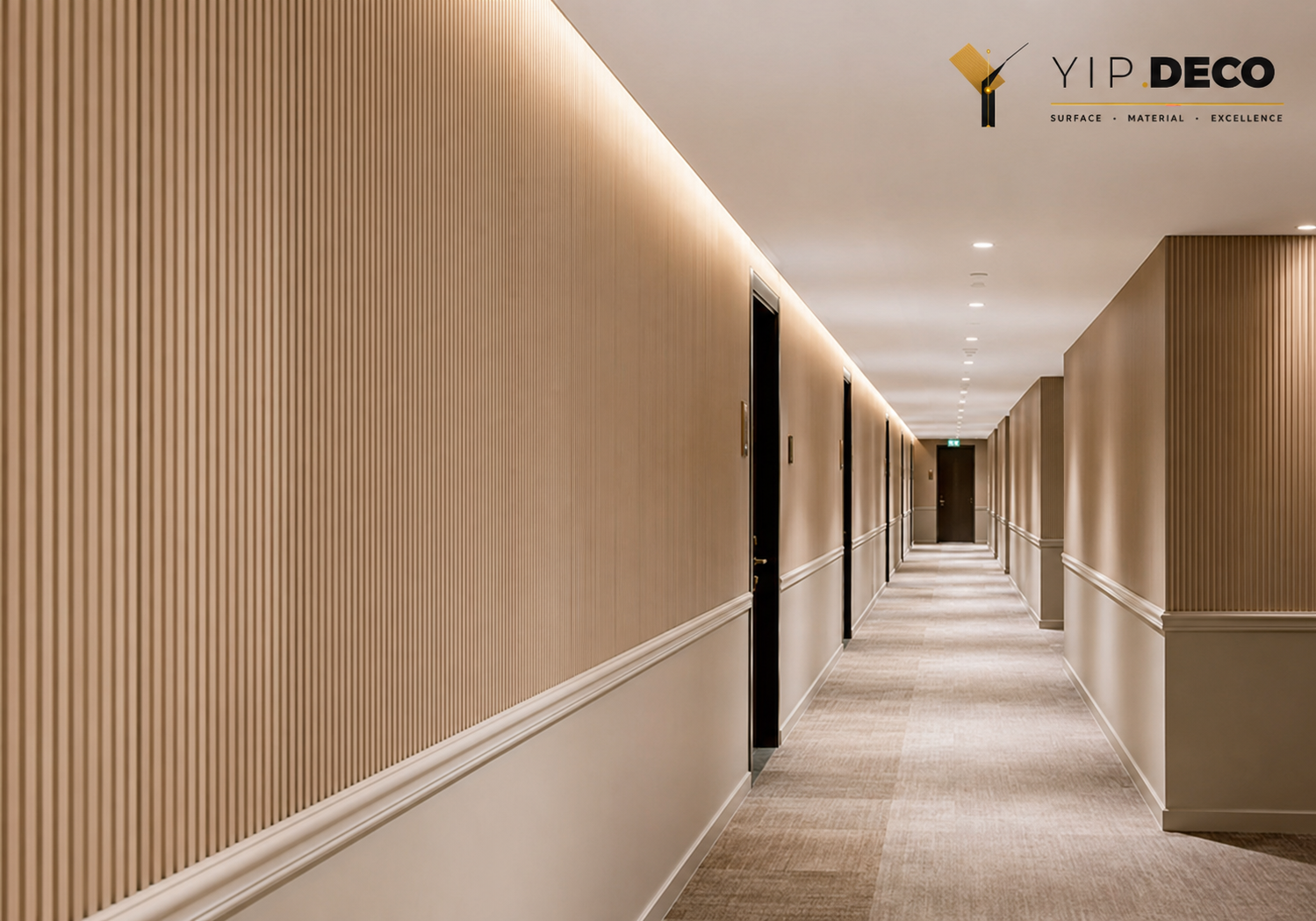 Long corridor with fluted wall panels and waist moulding for visual rhythm and wall protection