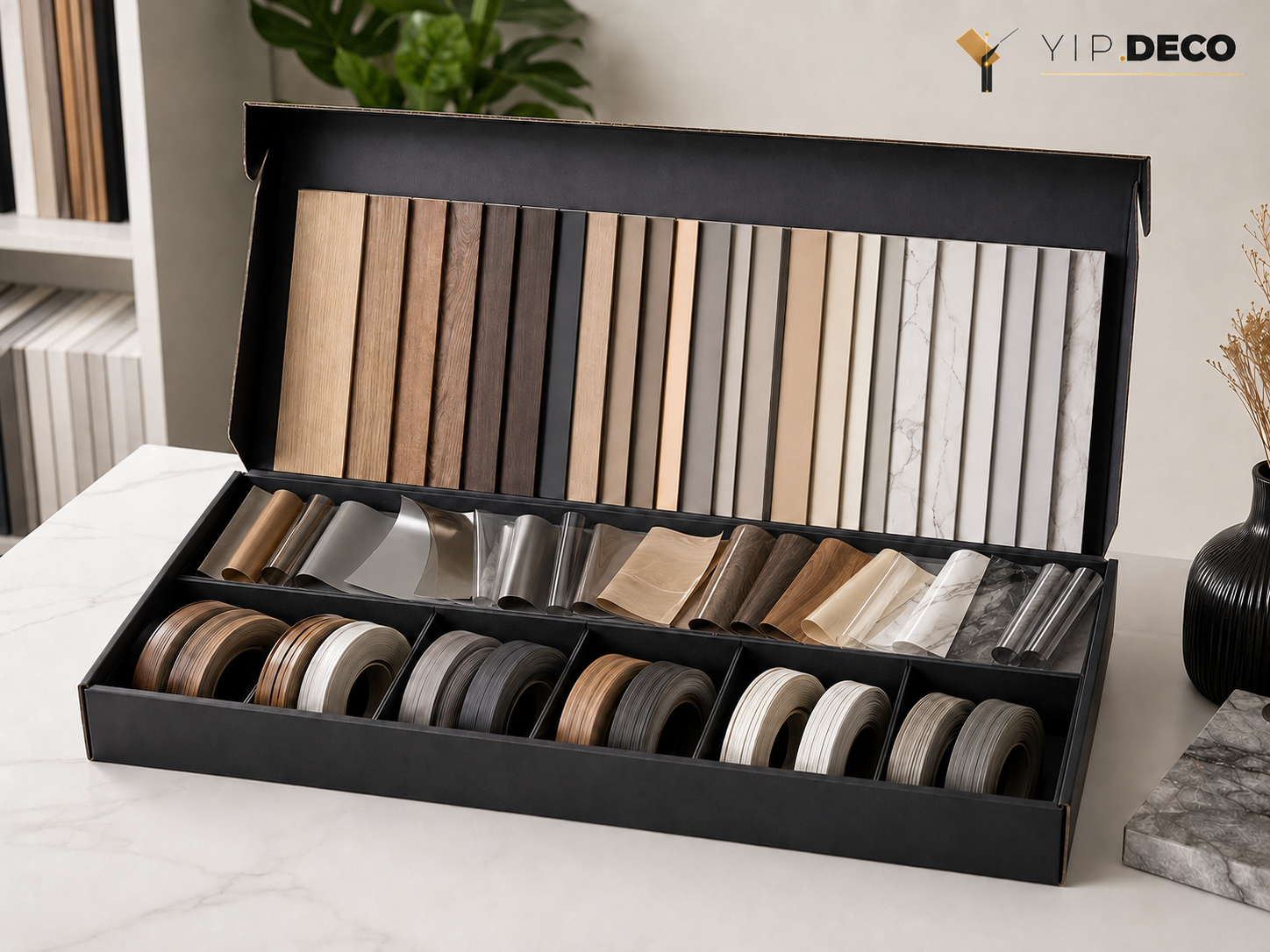 Open YipDeco sample kit box showing wall panel swatches, surface foil chips and edge banding color samples from 264-color library